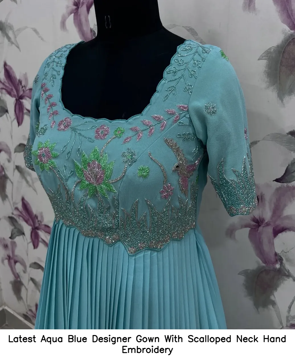 Latest Aqua Blue Designer Gown With Scalloped Neck Hand Embroidery