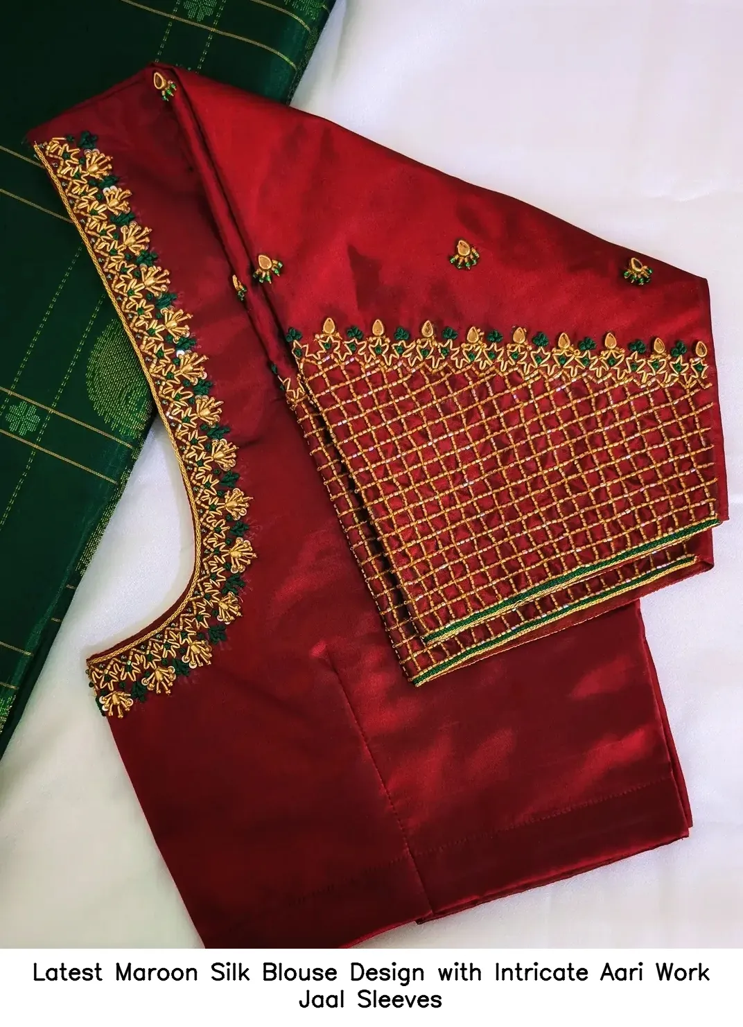 Latest Maroon Silk Blouse Design with Intricate Aari Work Jaal Sleeves