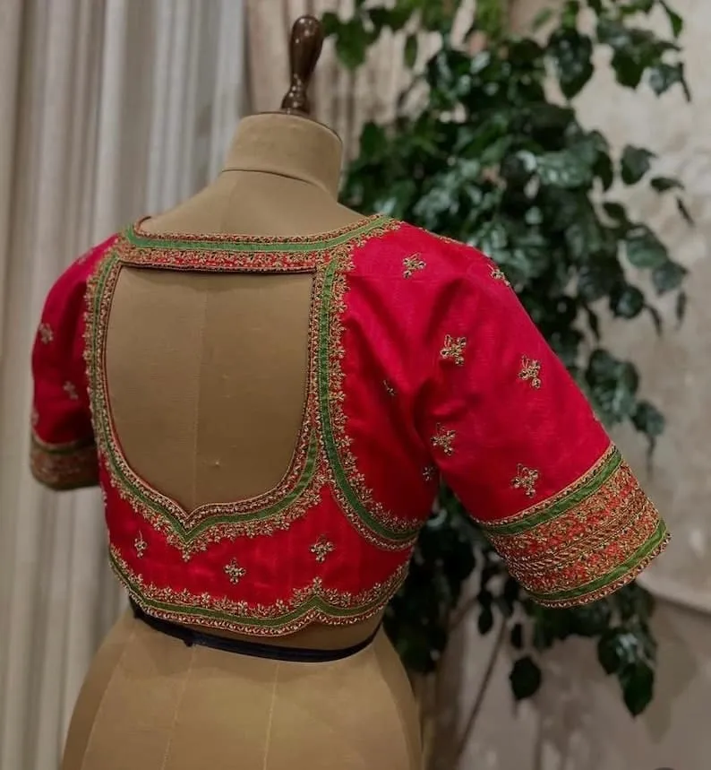 Bright Red Raw Silk Bridal Blouse with Green Contrast Border | Zardozi Work Cutout Back Saree Blouse