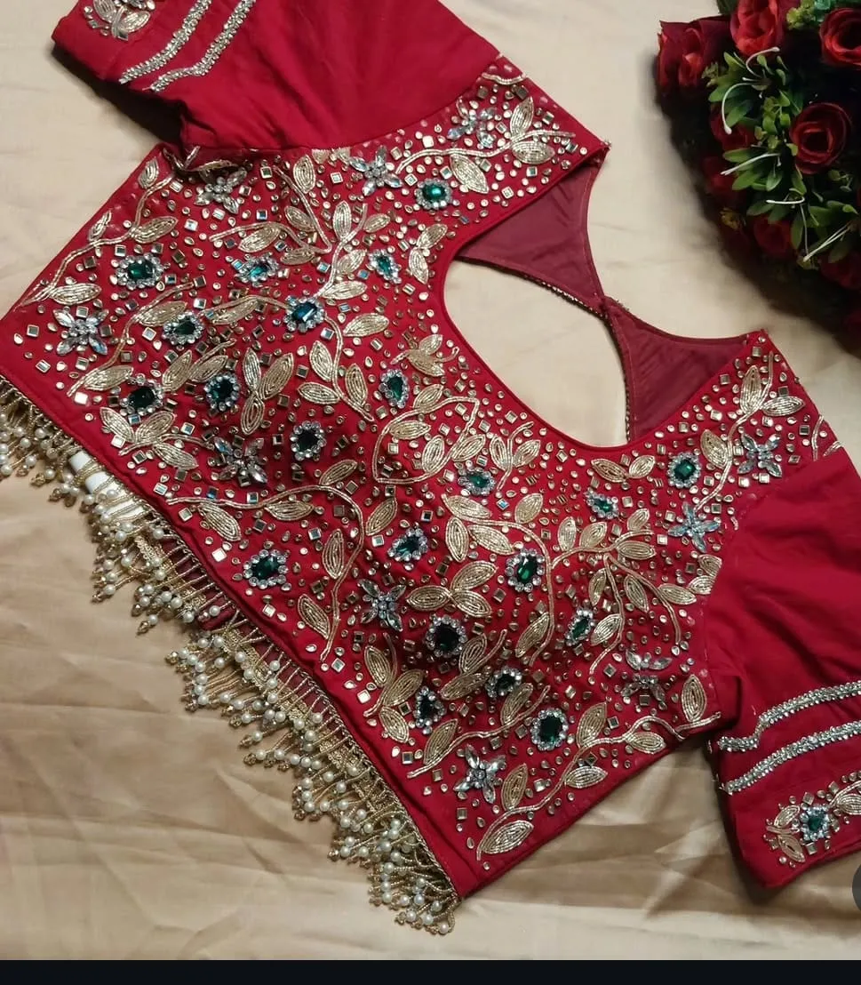 Bridal Red Handwork Saree Blouse with Green Stone Accents, Pearl Latkan & Cutout Back Design 1