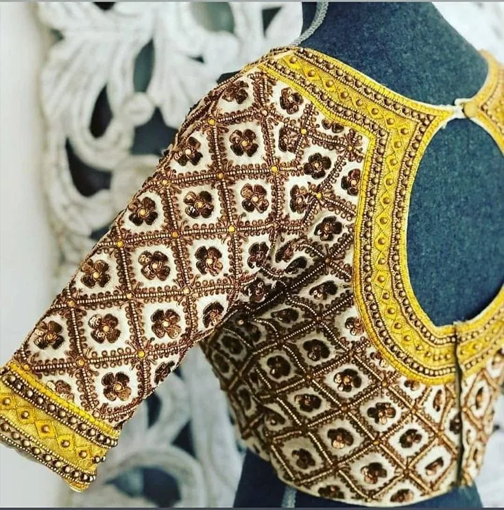 Cream Raw Silk Aari Work Blouse – Geometric Floral Jaal & Yellow Border Designer Bridal Choli