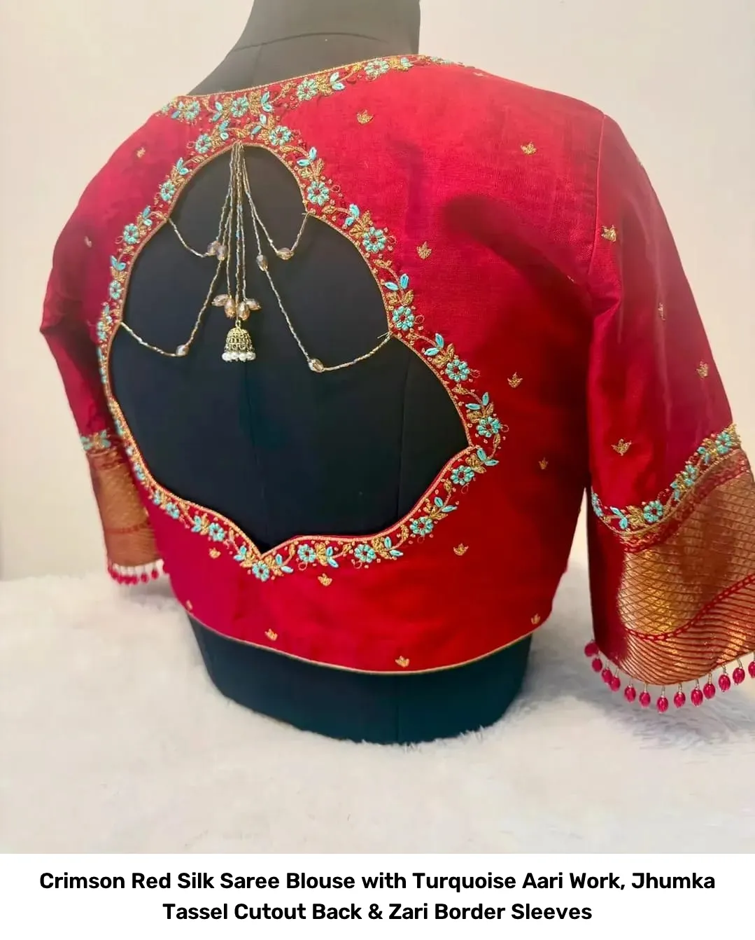 Crimson Red Silk Saree Blouse with Turquoise Aari Work, Jhumka Tassel Cutout Back & Zari Border Sleeves 2