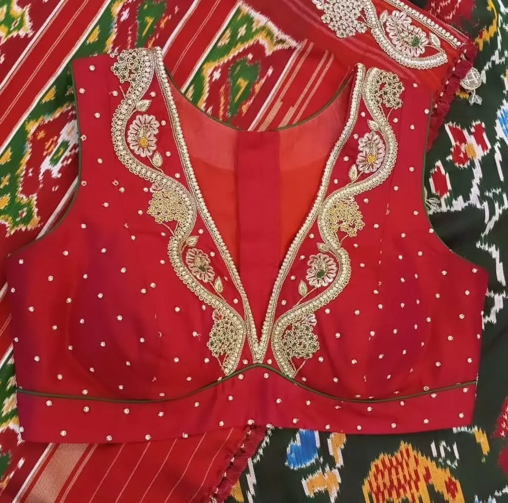 Designer Red Sleeveless Silk Saree Blouse | Hand-Embroidered Deep V-Neck & Pearl Booti Bridal Blouse 1