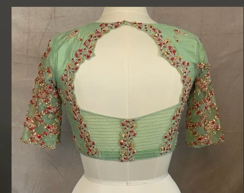 Hand Embroidered Mint Green Silk Bridal Blouse with Red Floral Zardozi & Net Sleeve Work