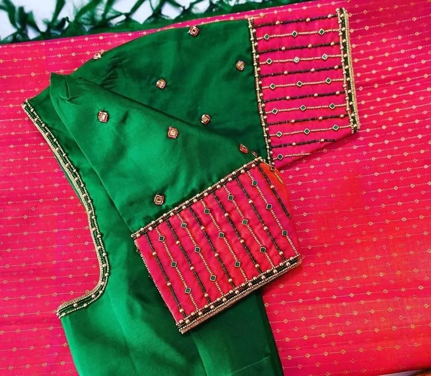 Handcrafted Aari Work Emerald Green Silk Blouse – Contrast Pink Sleeves with Kundan Stone & Bead Border