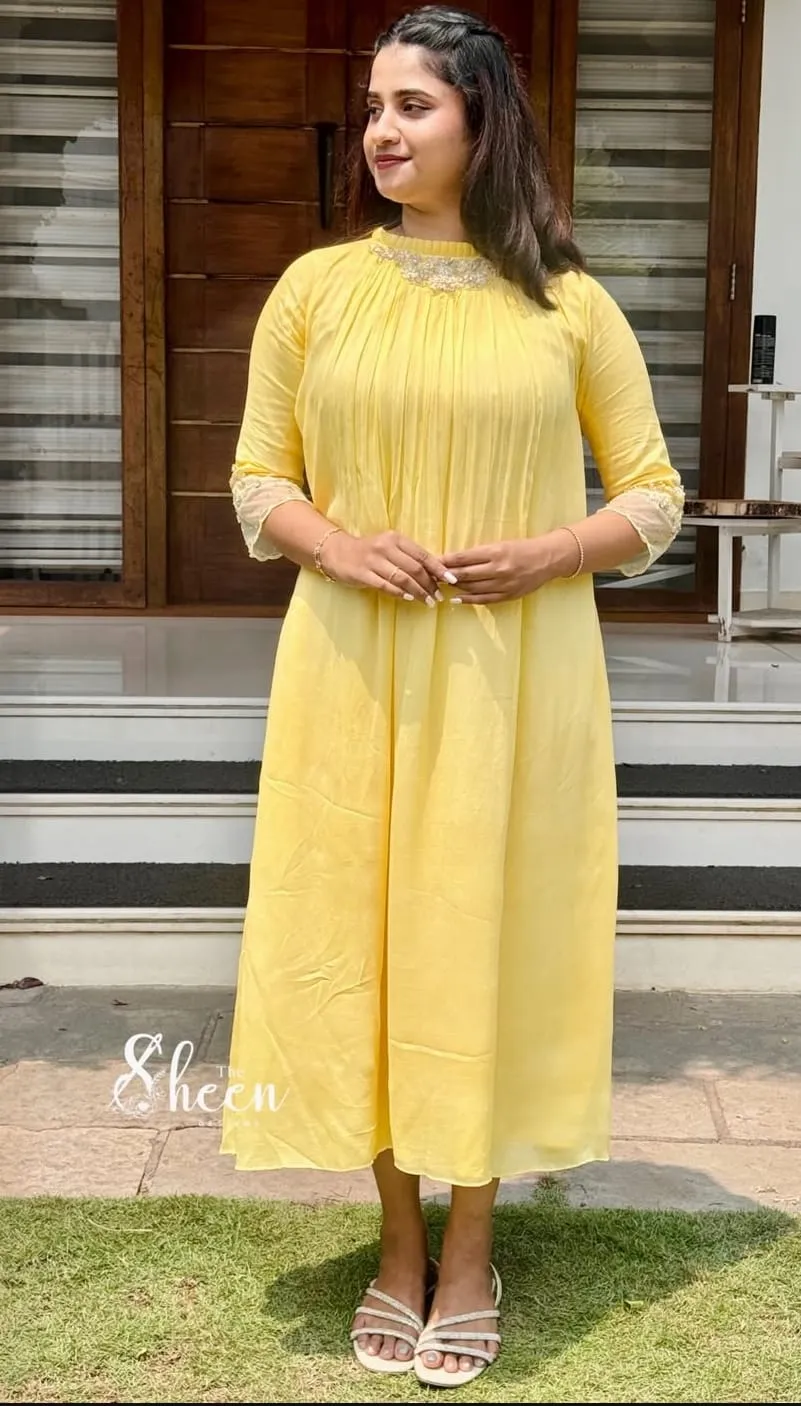 Light Yellow Georgette Pleated Anarkali Suit – Frill Collar Handwork Yoke & Net Cuffs Party Wear Dress