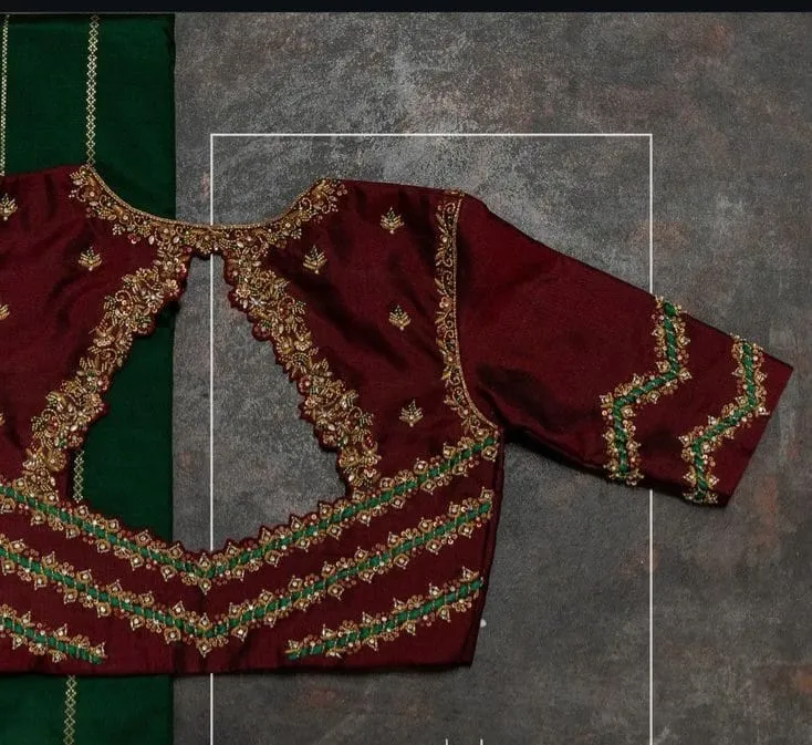 Maroon Raw Silk Cut-Out Back Maggam Work Blouse | Handcrafted Zardosi & Green Stone Embroidered Saree Blouse 1