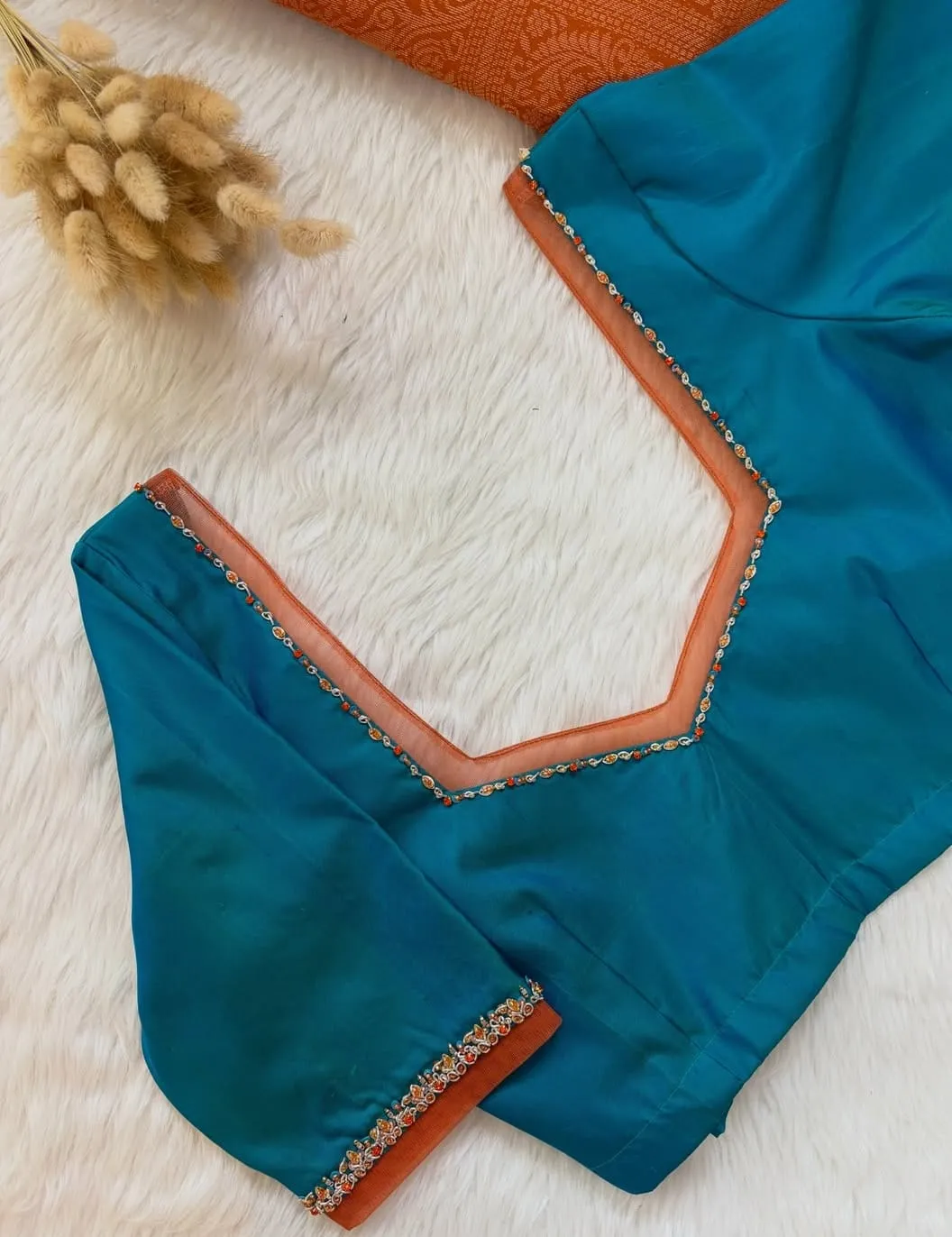 Peacock Blue Silk Maggam Work Blouse | Contrast Rust Orange Border Aari Beadwork V-Neck Saree Blouse