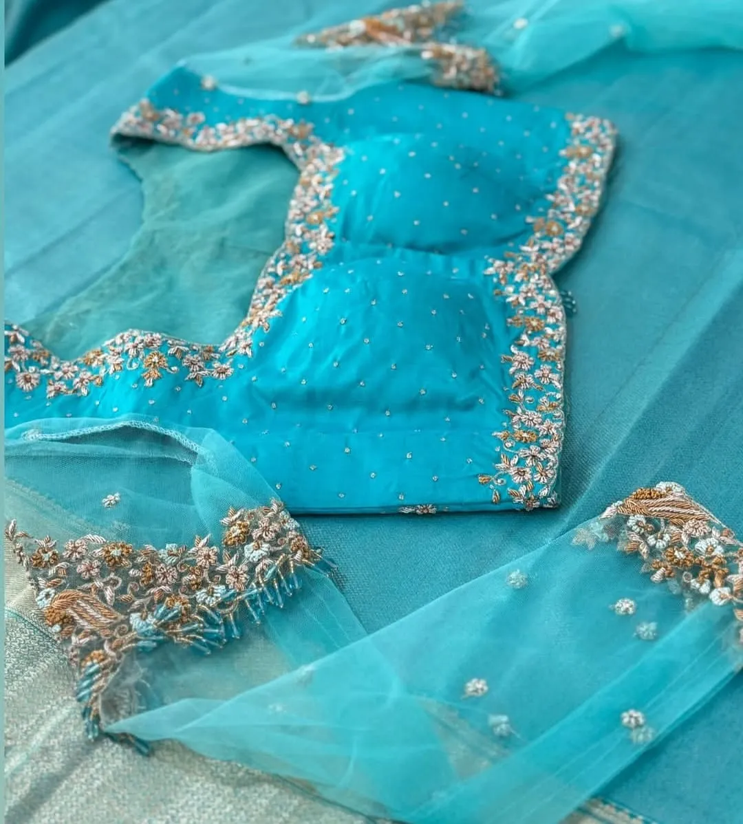 Sky Blue Padded Silk Blouse | Heavy Zardozi Hand Embroidery & Sheer Net Sleeves with Tassel Drops
