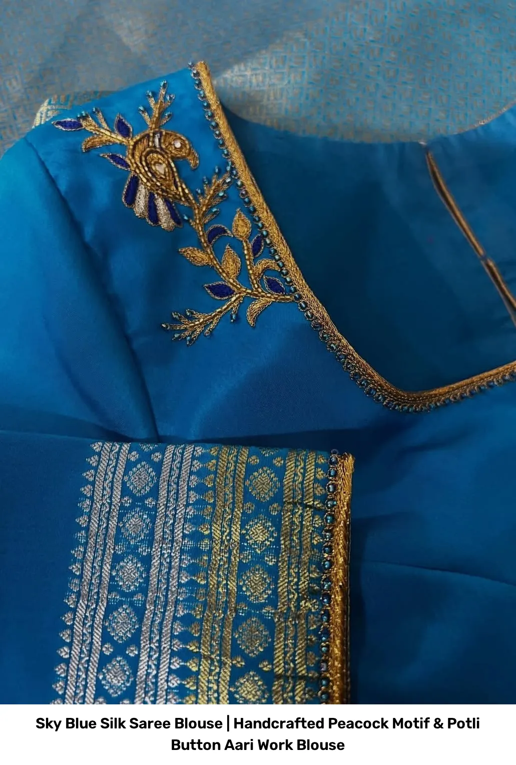 Sky Blue Silk Saree Blouse | Handcrafted Peacock Motif & Potli Button Aari Work Blouse 2