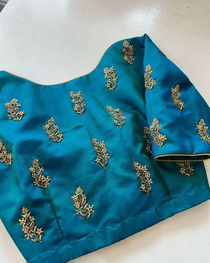 Teal Blue Embroidered Silk Blouse with Handcrafted Golden Maggam Buttis – Wedding & Festive Saree Blouse