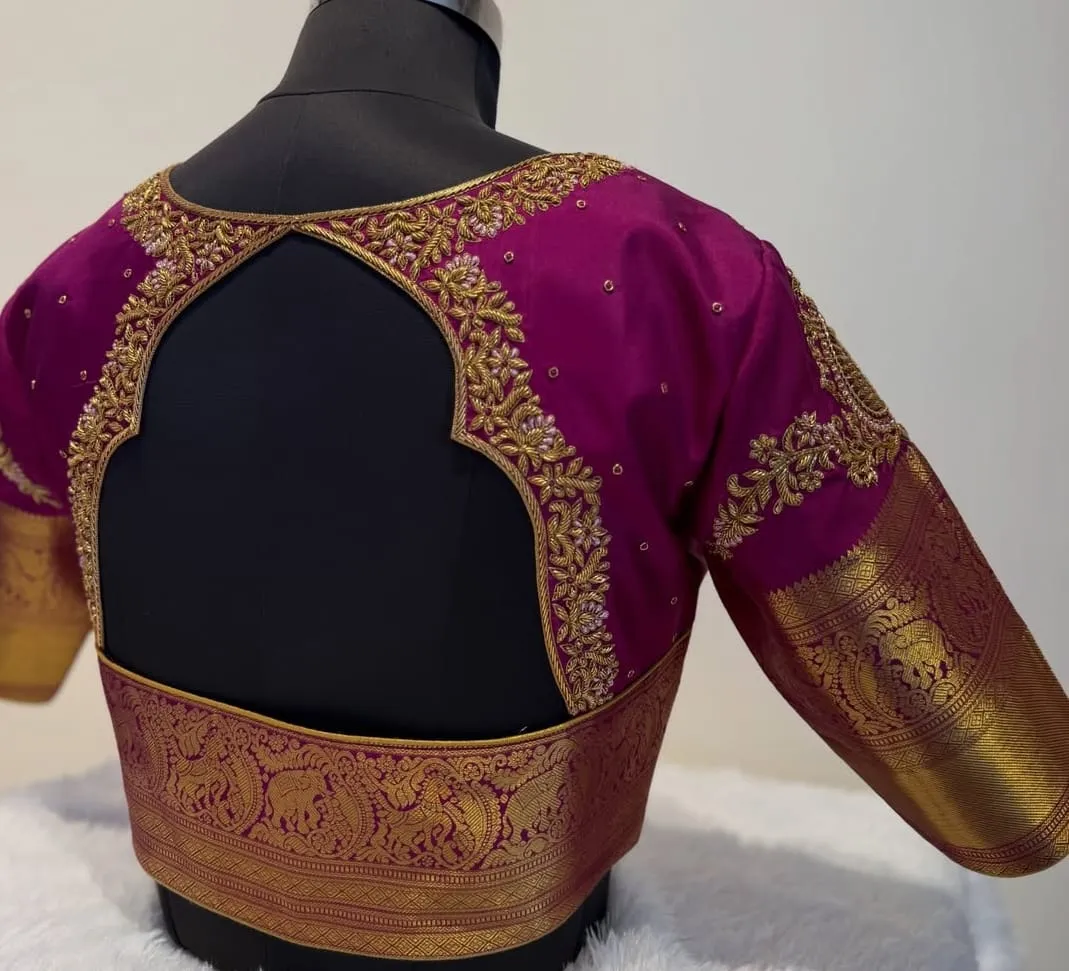 Magenta Silk Bridal Saree Blouse – Gold Zari Maggam Work Cut-Out Back Neck & Kanjivaram Zari Border Elbow Sleeves