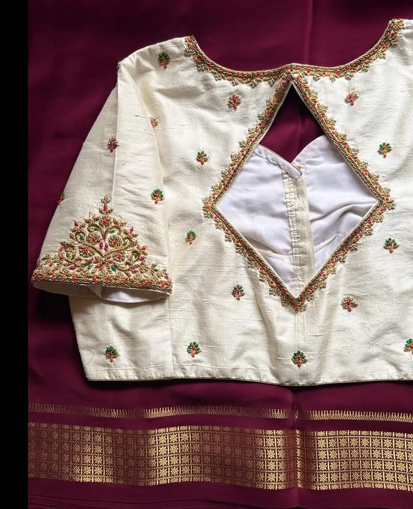 Off-White Raw Silk Blouse | Handcrafted Maggam Work Diamond Cutout Back & Embroidered Motif Sleeves