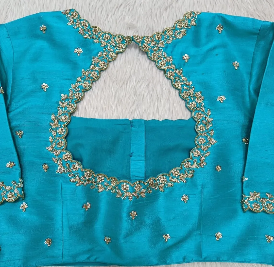 Teal Blue Raw Silk Maggam Work Blouse with Scalloped Cutwork Keyhole Back & Floral Border