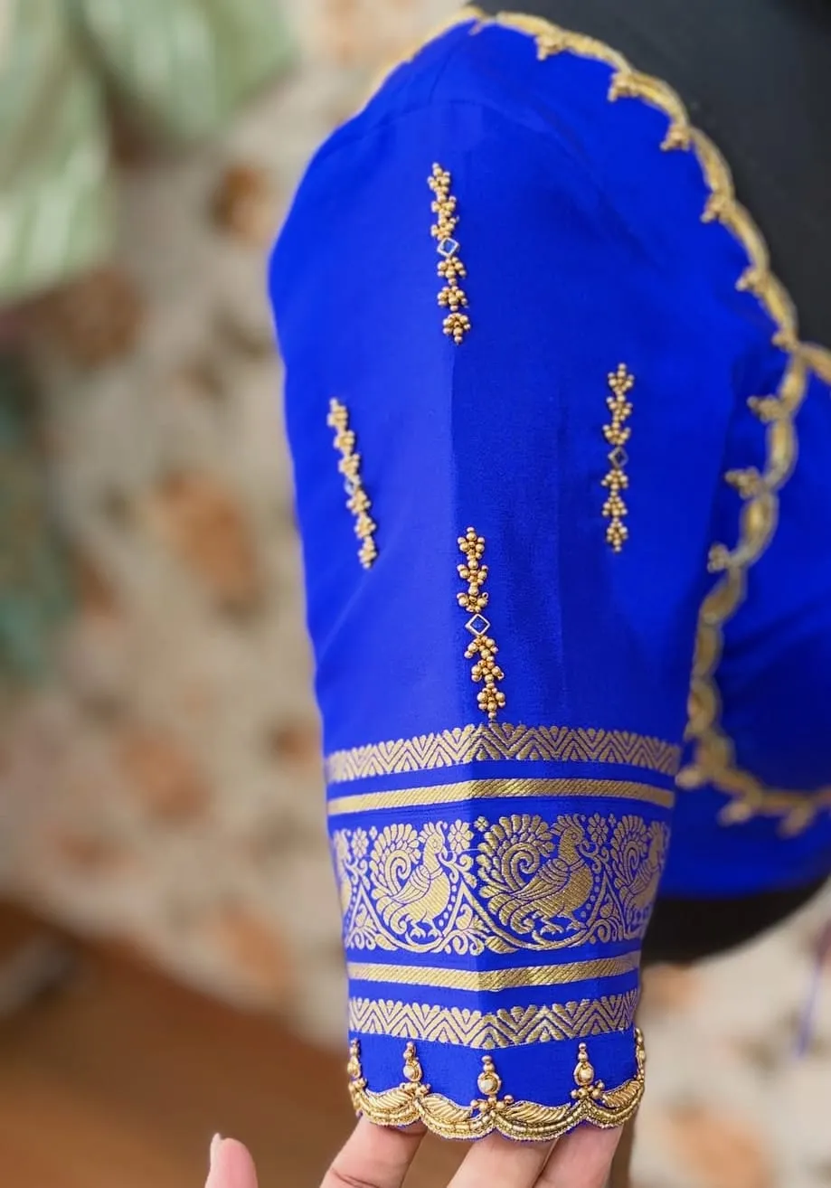 Royal Blue Maggam Work Blouse – Scallop Cutwork Border & Gold Peacock Zari Sleeve Silk Saree Blouse