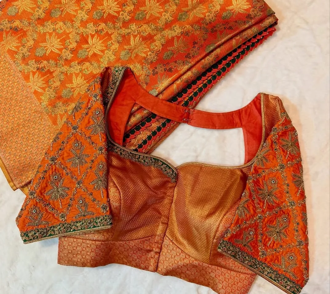 Rust Orange Silk Bridal Blouse with Green Zardozi Border & Jaal Sleeve Embroidery | Designer Deep Cutout Back Saree Blouse